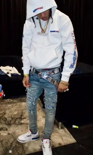 Kay Flock wearing Amiri jeans