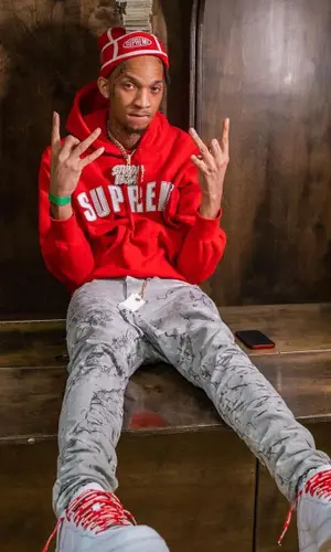 Stunna 4 Vegas wearing Supreme hat