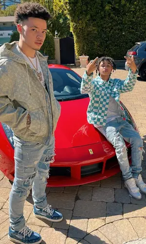 Lil Mosey’s Outfit in Louis Vuitton Hoodie, Giuseppe Zanotti Belt & NBA (2021)