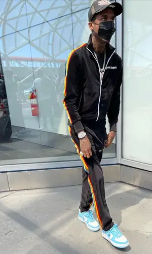 Lil Reese wearing Bape sneakers