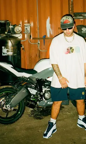 Feid wearing Feid Merch t-shirt