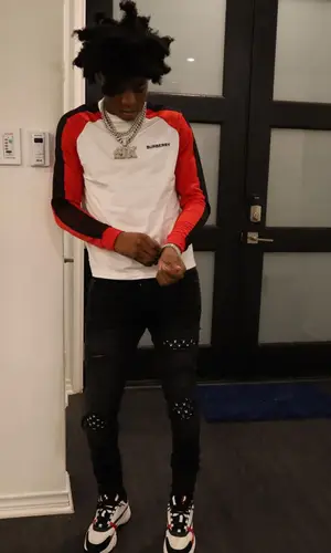 Yungeen Ace wearing Burberry sweatshirt