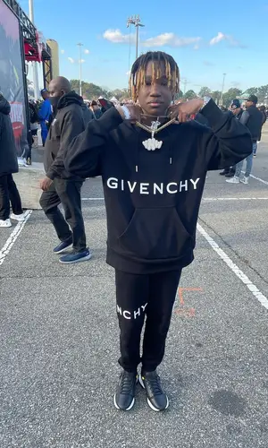 YNW BSlime wearing Givenchy pants
