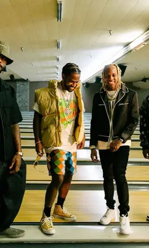 HitBoy wearing Kapital jeans