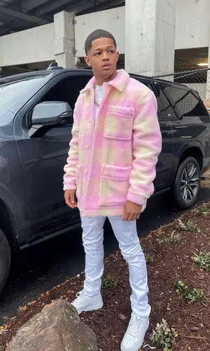 YK Osiris’ Outfit in Lacoste Shirt, Amiri Jeans & Nike Sneakers (2021)