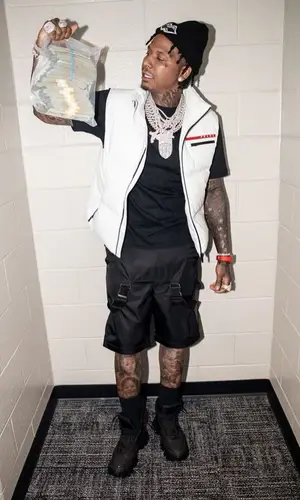 Moneybagg Yo wearing Prada sock
