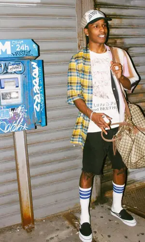 ASAP Rocky wearing Gucci bag