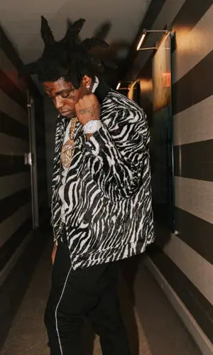 Kodak Black wearing Gucci belt