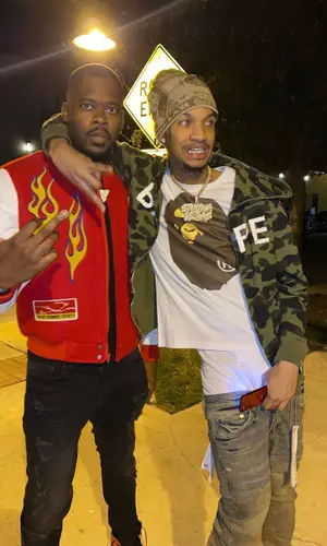 Stunna 4 Vegas wearing Supreme hat