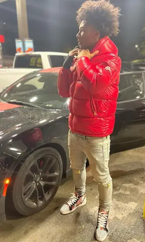 Mikey wearing Moncler jacket