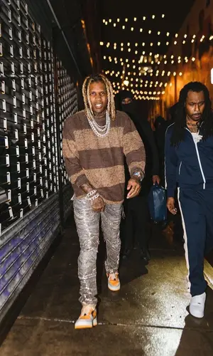 Lil Durk wearing Mastermind sweater