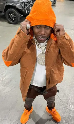 DaBaby wearing Louis Vuitton belt