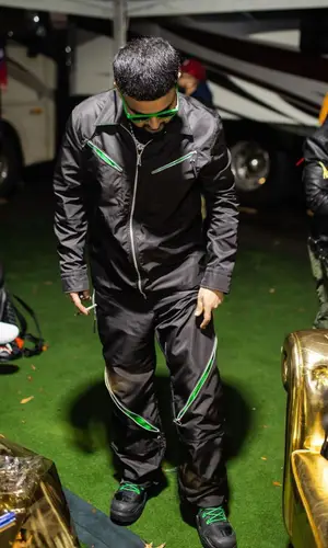 Nav wearing Bottega Veneta boots