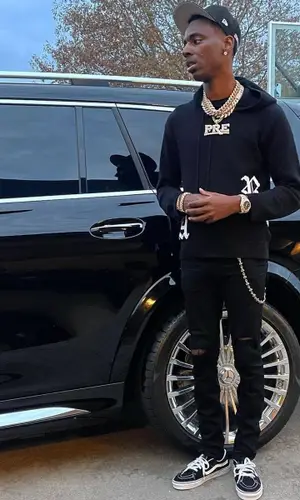 Young Dolph’s Outfit in Rta Hoodie, Amiri Jeans & Vans Sneakers (2021)