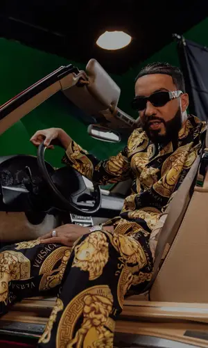 French Montana wearing Versace shirt