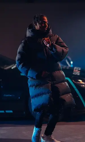 Russ Millions wearing Amiri hoody