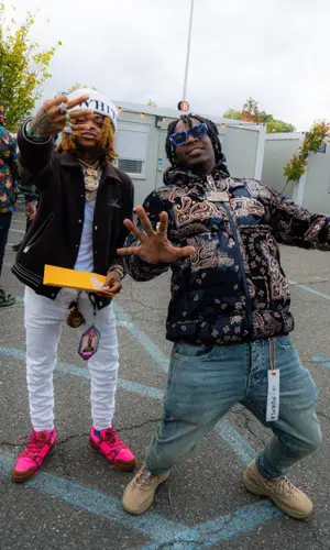 SpotemGottem wearing Amiri jeans
