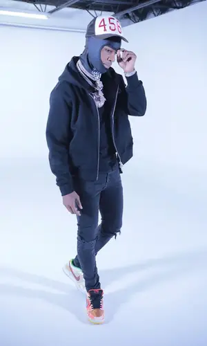 Toosii wearing Amiri hoody