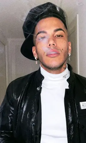 Sfera Ebbasta wearing Prada top