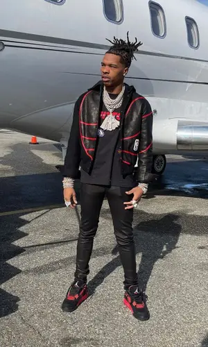 Lil Baby wearing Amiri trousers