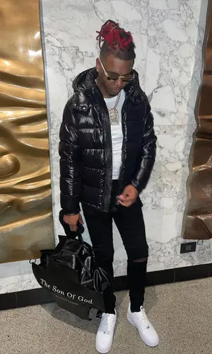 Lil Keed wearing Moncler jacket