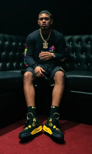 Myke Towers’ Outfit in Chrome Hearts Sweatshirt & Jordan Sneakers (2021)