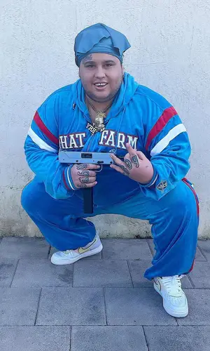 Fat Nick wearing Phat Farm pants