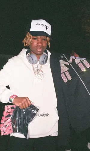 YNW BSlime wearing Girls Like Molly cap