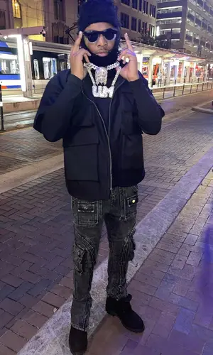 Lil Keed wearing Greedy Unit hat