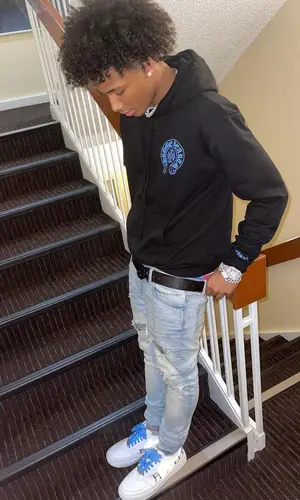 Mikey wearing Gucci belt