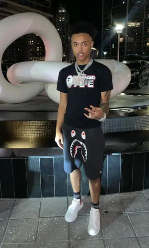 Luh Kel’s Outfit in Bape T-Shirt & Alexander McQueen Sneakers (2021)