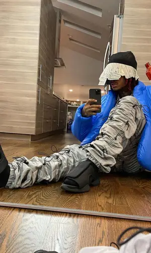 Lil Gnar wearing Yeezy jacket