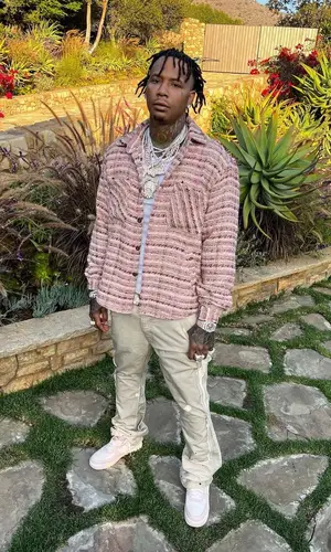 Moneybagg Yo wearing Gallery Dept. pants