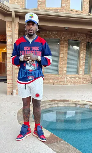 Sauce Walka wearing Global Currency cap
