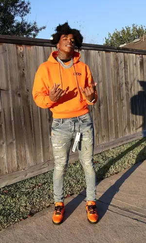Yungeen Ace wearing Purple Brand jeans