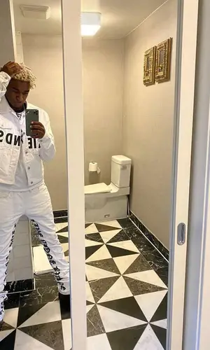 Ken Carson wearing Vlone jacket