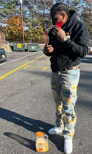 Fivio Foreign wearing Rhude hoody