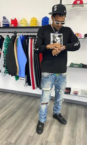 Lil Raven wearing B.B. Simon belt