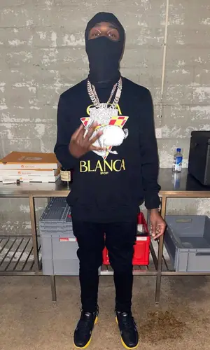 Lil Tjay wearing Casablanca sweatshirt