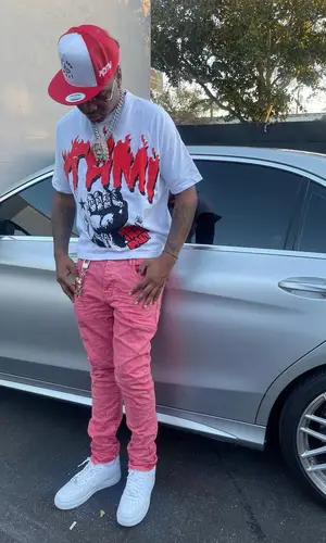 Lil Keed wearing Itami t-shirt