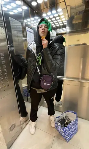 Yungway wearing Aape bag