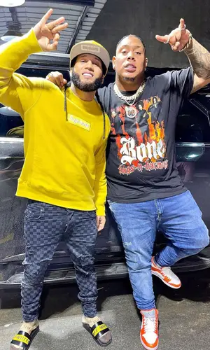 El Alfa El Jefe wearing Supreme sweatshirt