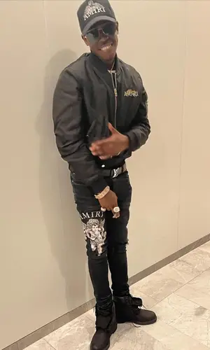 Bobby Shmurda wearing Louis Vuitton belt
