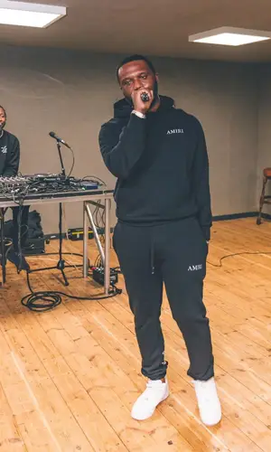 Headie One wearing Amiri pants