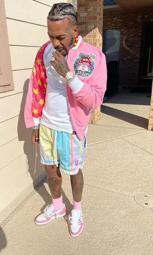 Sauce Walka wearing Collect and Select shorts