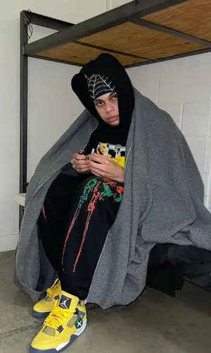 D Savage wearing Adidas sock