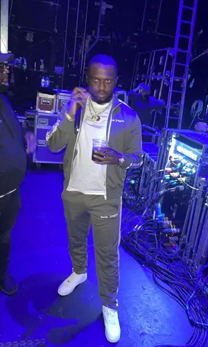 Headie One wearing Palm Angels jacket