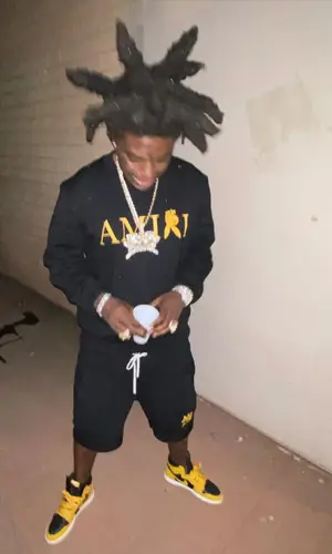 Kodak Black wearing Amiri sweatshirt