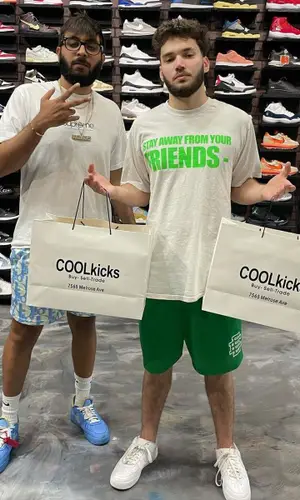 Adin Ross wearing Eric Emanuel shorts