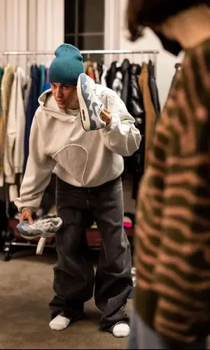 Justin Bieber’s Outfit in ERL Hoodie, Acne Studios Jeans & X Karla Hat (2021)